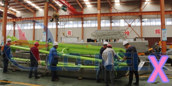 混凝土布料機在橋涵面布料時，應如何完成滑模攤鋪？